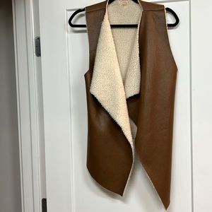 Brown and white vest